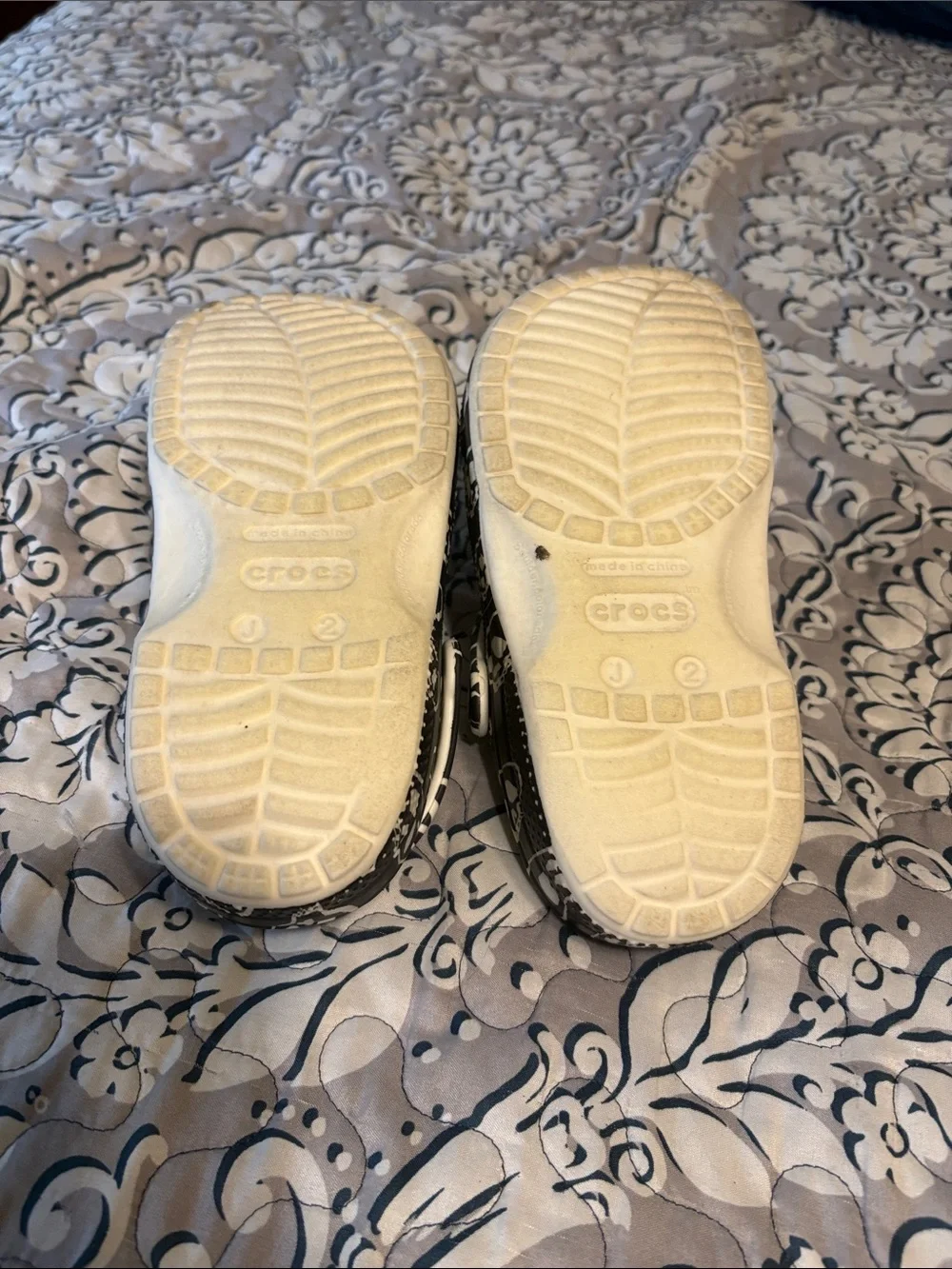 Crocs junior size 2, go in the dark shoes